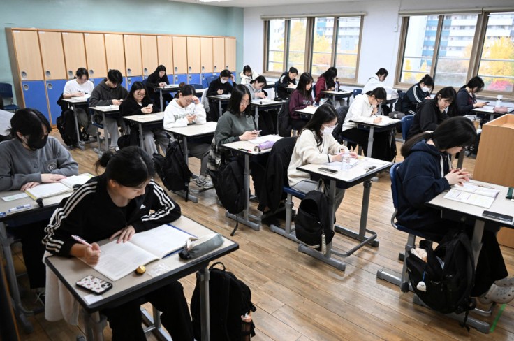 South Korean students wait to take the annual College Scholastic