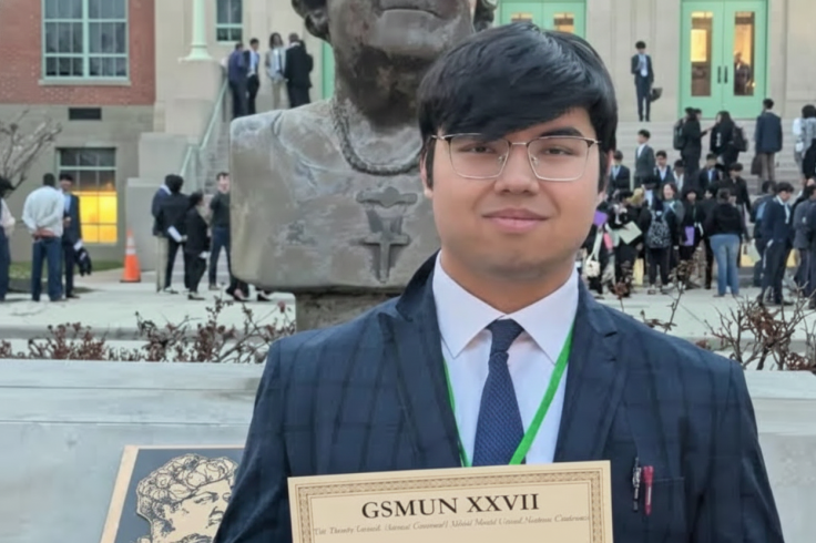 Mukhammad Aziz Umurzokov With Statue