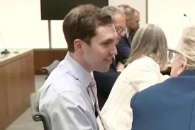 Tyler Robinson seen smiling court during hearing